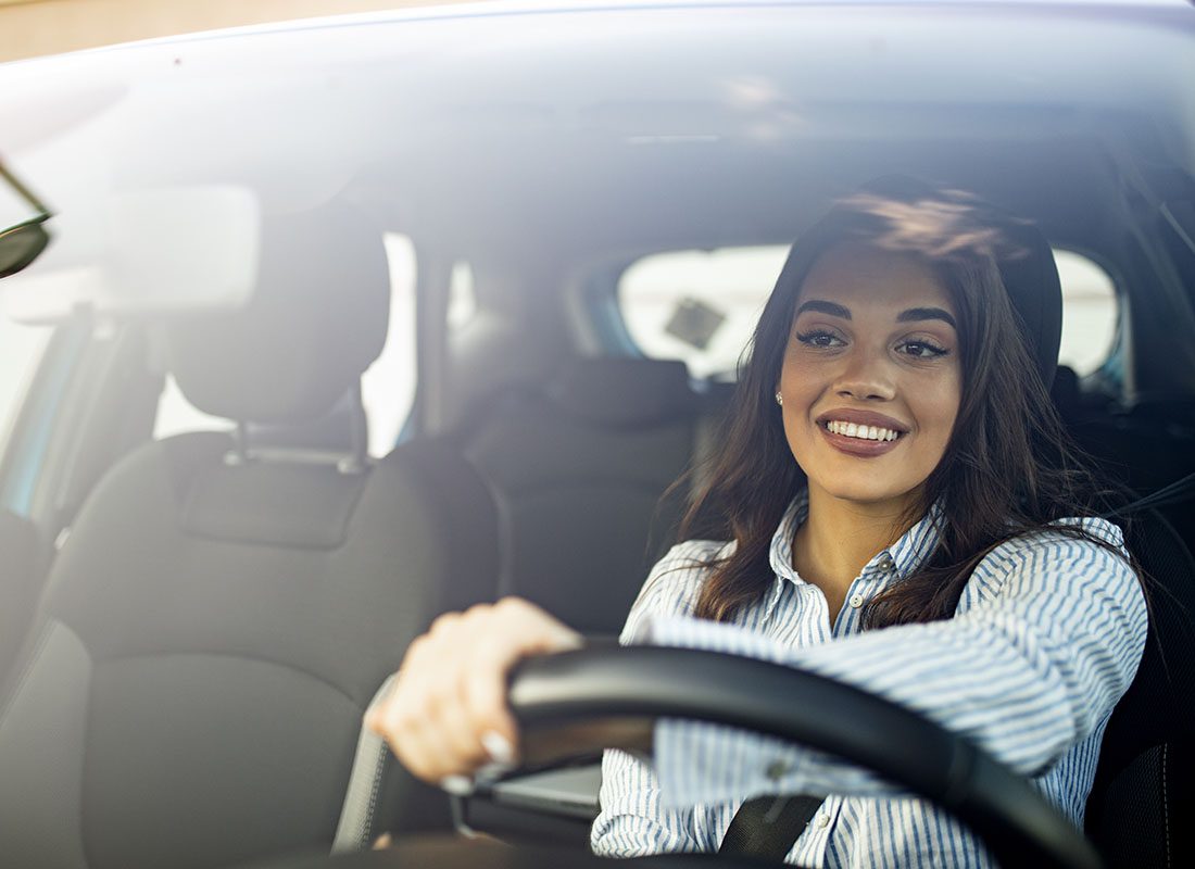 Request Auto ID Card - Woman in Car Driving to Work with the Sun on the Dashboard