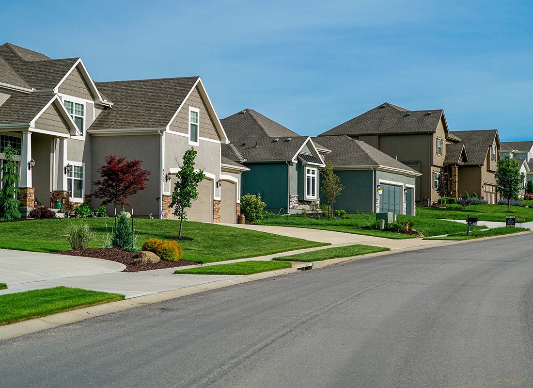 Metamora, Mi - Group of Residential Homes With Small Trees on a Sunny Day